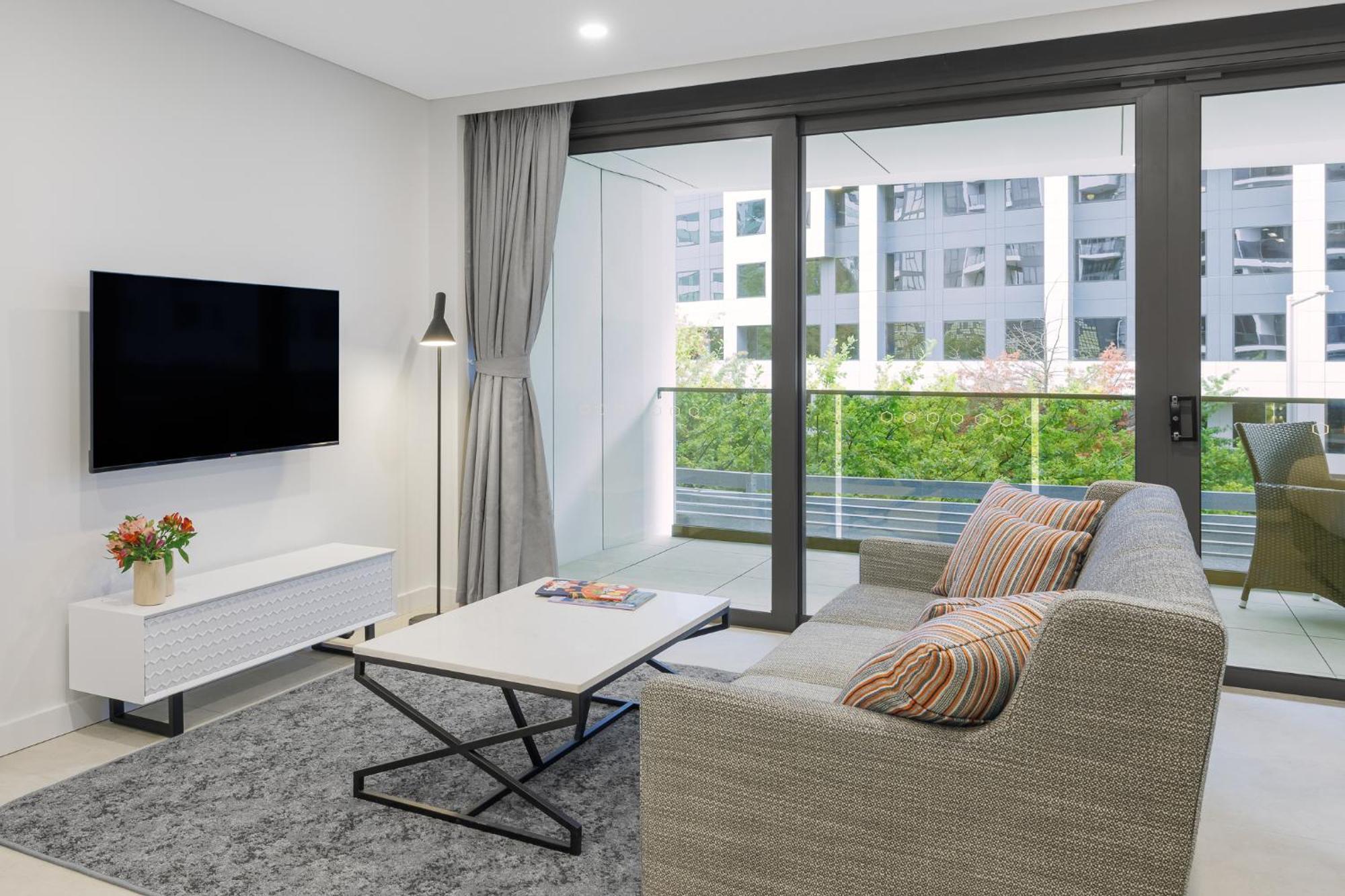 Meriton Suites Canberra Luaran gambar Living room